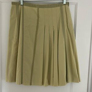 Spring green asymmetrical pleated skirt women’s size 8 elevenses Anthropologie